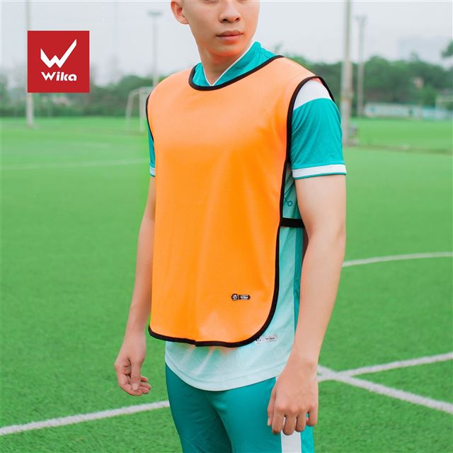 Áo tập Wika dáng hai tà cam